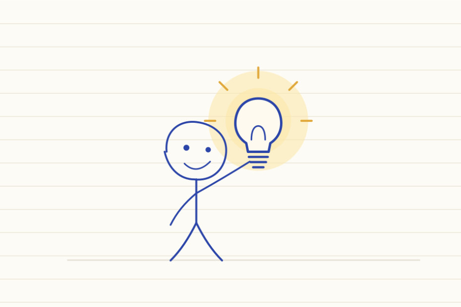 Notebook drawing of a smiling stick figure holding up a glowing light bulb